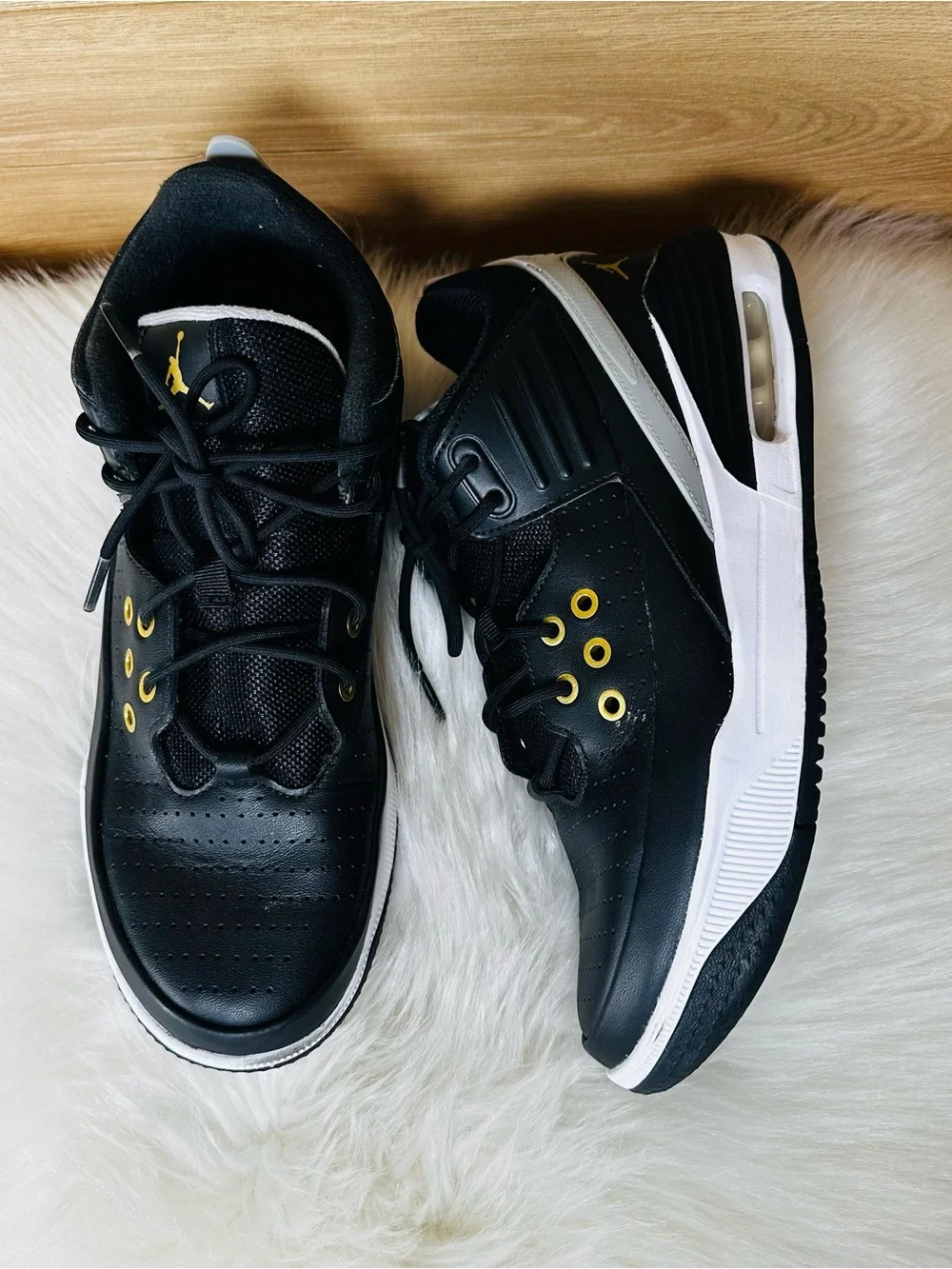 Jordan Max Aura 5 Black and Gold Athletic Sneakers